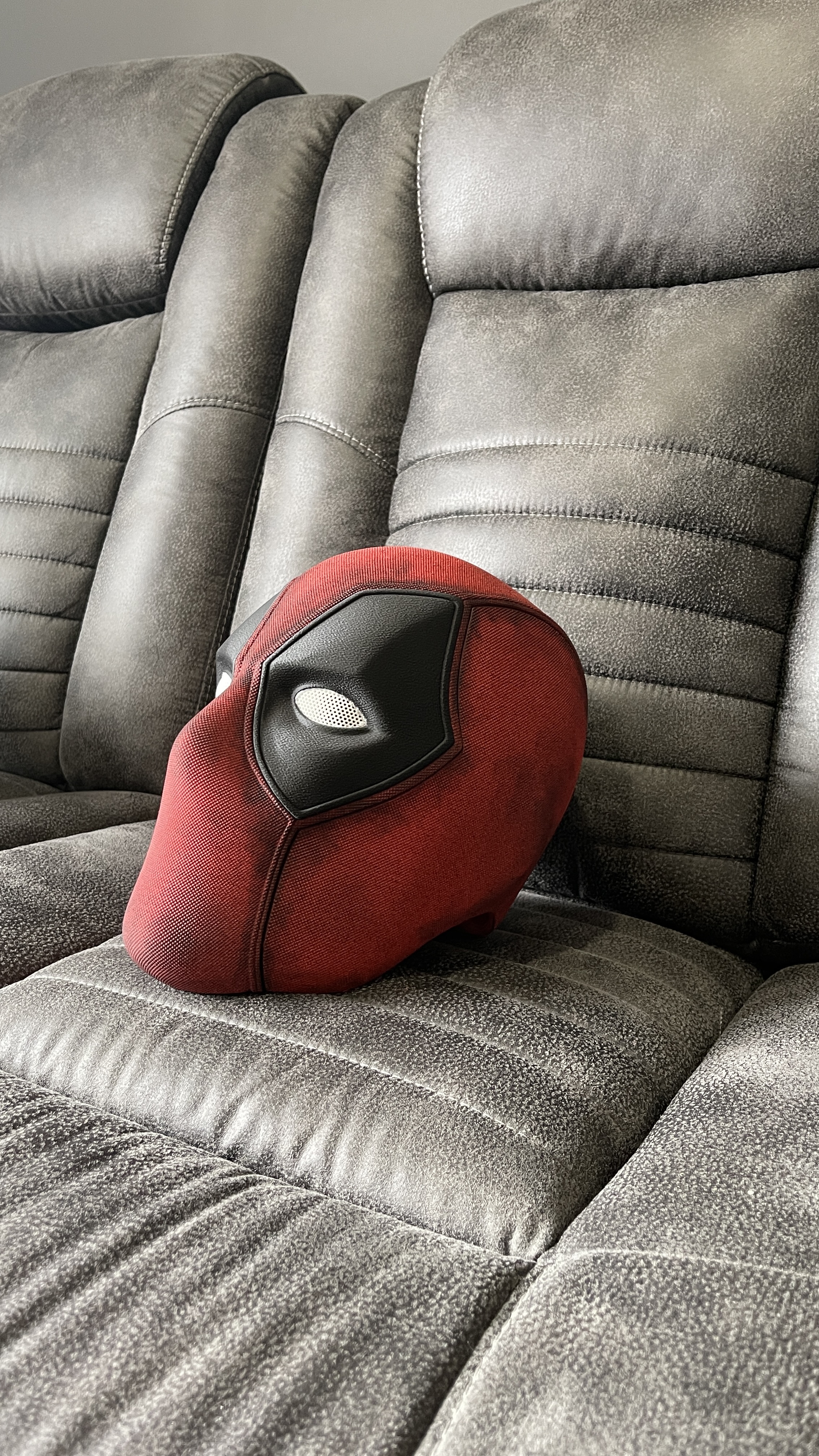 Deadpool-inspired mask detail — hand-painted red and black finish with mesh eyes