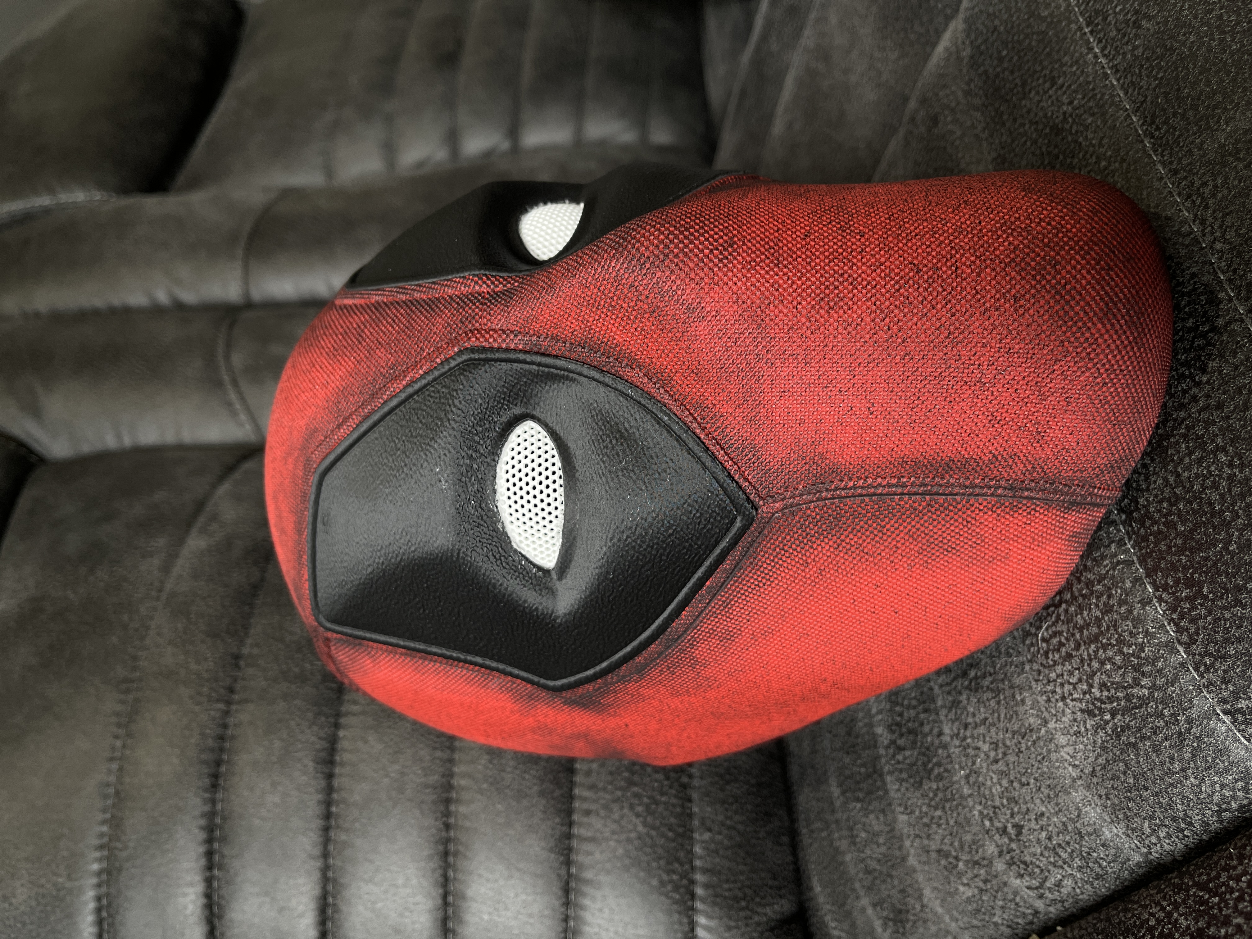 Deadpool-inspired mask detail — hand-painted red and black finish with mesh eyes