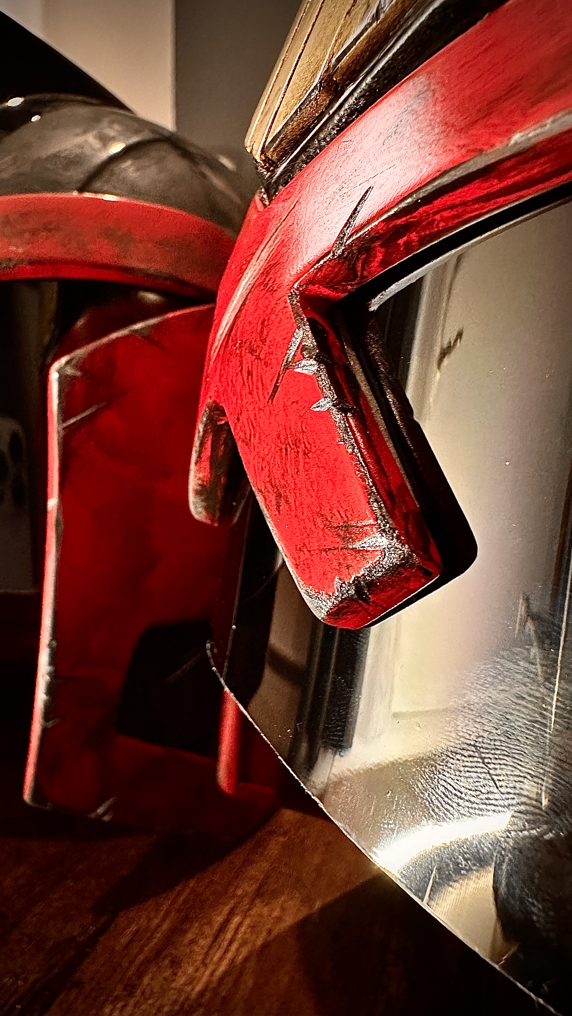 Judge Dredd-inspired cosplay helmet detail — hand-painted battle-worn finish and tinted visor